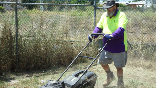 employment lawn mower man